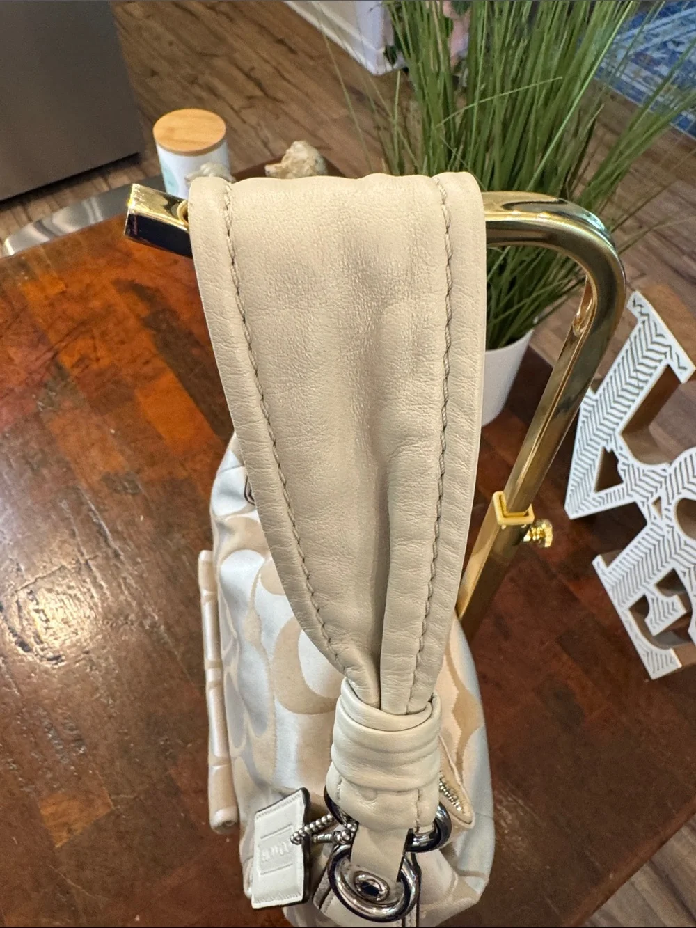 Coach Beige Signature Hobo Bag with Turn-Lock Pocket